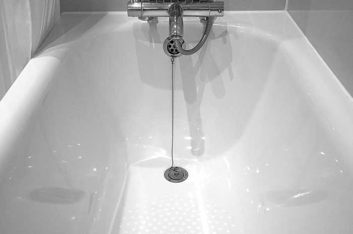 Comment débloquer une canalisation de bain